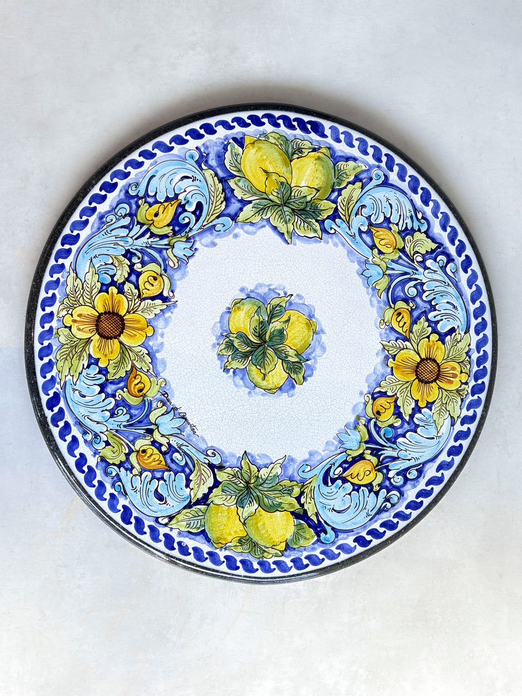 Hand-painted volcanic stone round table H54cm with iron base