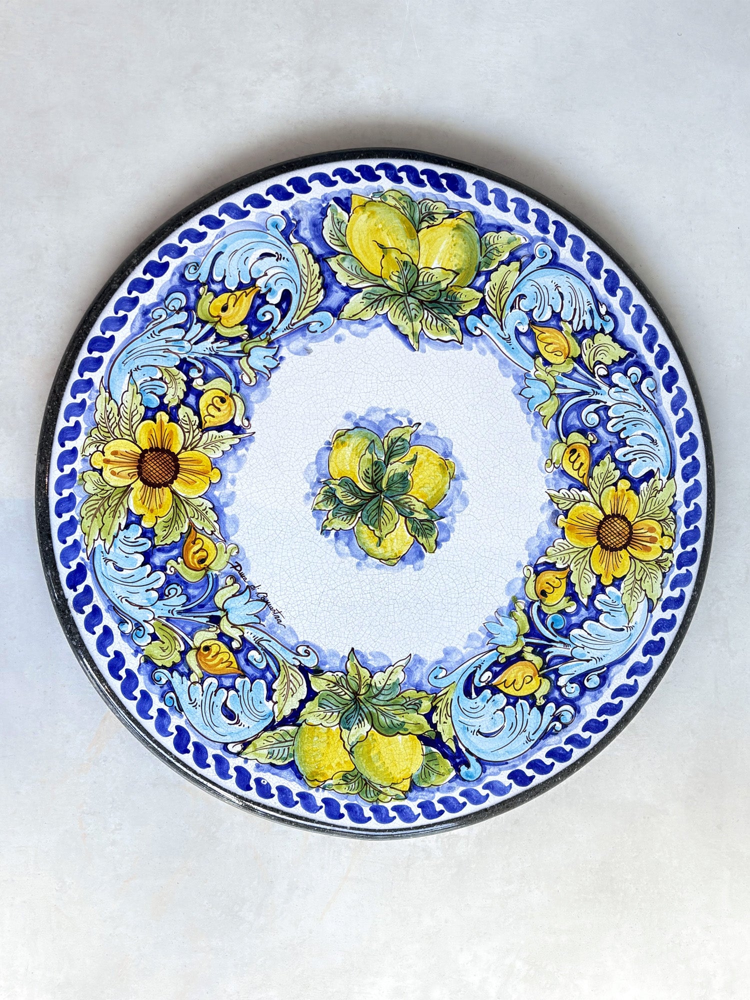 Hand-painted volcanic stone round table H54cm with iron base