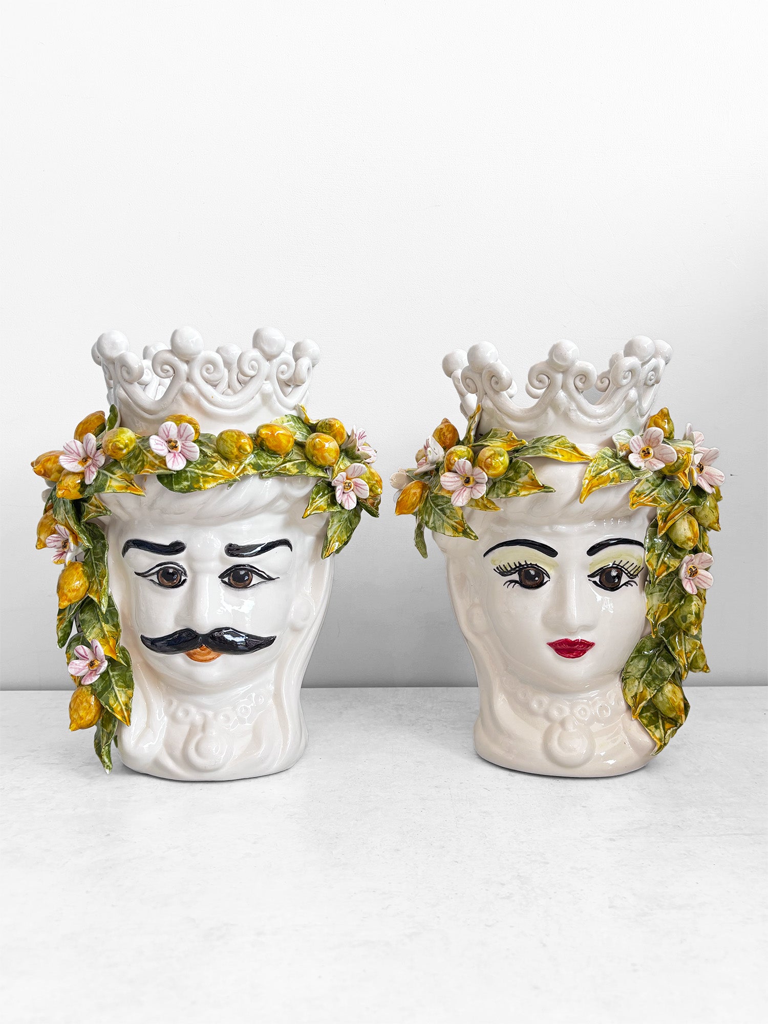 White Sicilian Moor Head vases with colourful lemons, set of 2